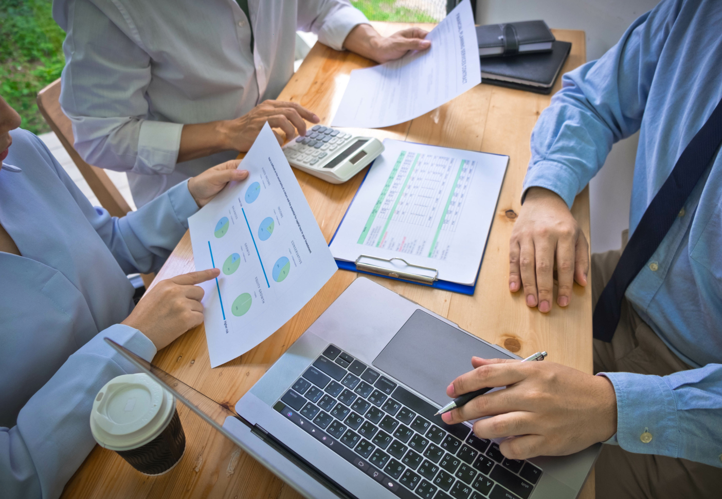 Workers discussing numbers at the office