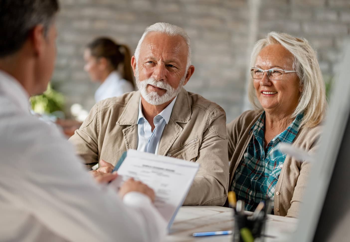 Doctor speaking to patients